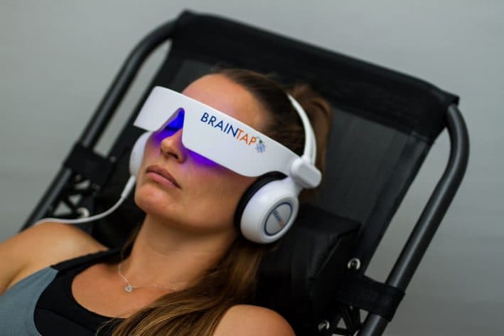 BrainTap headset session — light and sound therapy in clinic